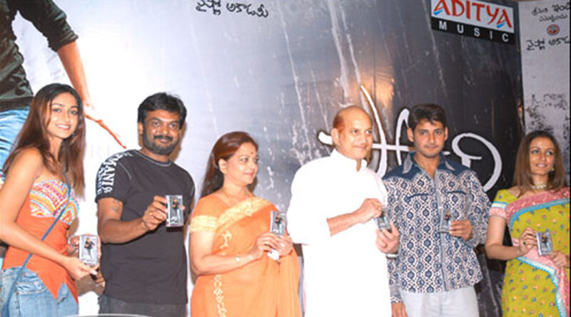 Grand Tollywood movie pre release event stage with massive LED screens and crowd